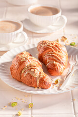 Delicious and sticky pistachio croissants ready to eat.