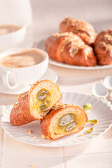 Homemade and hot pistachio croissants for breakfast