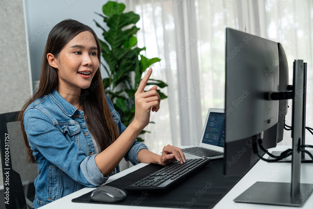 Poster young asian girl of it developer pointing online information on pc with coding program data applicat