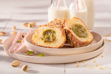 Homemade and yummy pistachio donuts as takeaway dessert.