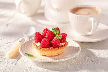 Sweet mini tart as an summer cake with coffee.