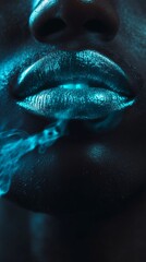 Obraz premium Close-up of shimmering lips with smoke effect in blue lighting, artistic expression concept