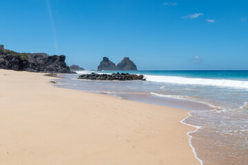 Fernando de Noronha, Brazil. View of Morro dos Dois Irmaos with crystal clear ocean