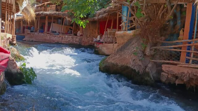 Dine by the Flow: Oum Rabia River's Serene Waterside Experience in Khenifra, Morocco