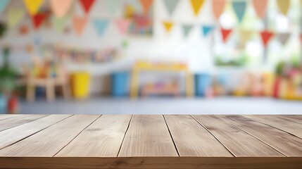Wooden table top with blurred festive background of a kindergarten classroom.
