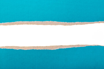 Blue turquoise ripped cardboard paper torn edges isolated on white background