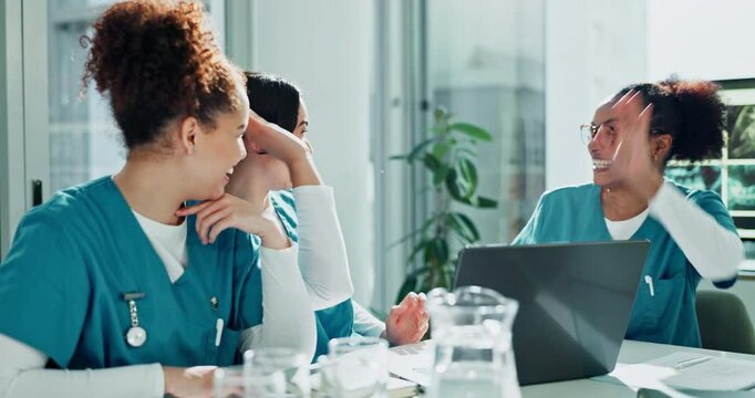 Medical team, laptop and high five in hospital for success, osteoporosis study and healthcare breakthrough. Women doctors, tech and excited in office for innovation, surgical planning and diagnosis