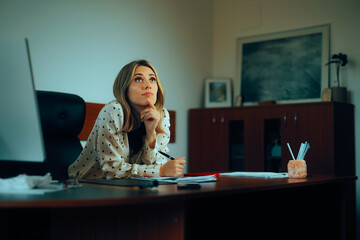 Businesswoman Sitting in the Office Thinking and Planning. Manager trying to find the best business...