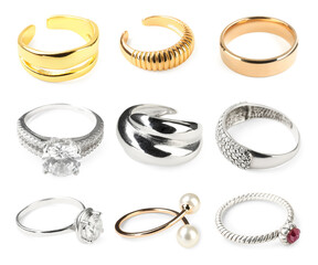 Stylish bijouterie. Many different rings isolated on white, collection