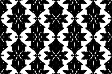 Ikat geometric folklore ornament with diamonds. Tribal ethnic vector texture. Seamless striped pattern in Aztec style. Folk embroidery. Indian, Scandinavian, Gypsy, Mexican, African rug.