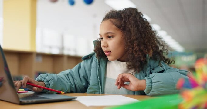 Girl, library and writing with laptop for education at primary school for online notes, project and assessment. Kid, elearning and smile with lesson or activity for brain development and growth