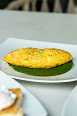 Closeup Hotel-Style Omelet: Fluffy and Flavorful Breakfast Delight with Fresh Ingredients 