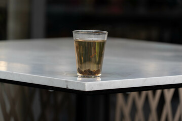 Hot Tea on White Table: Warm and Soothing Beverage for Relaxation