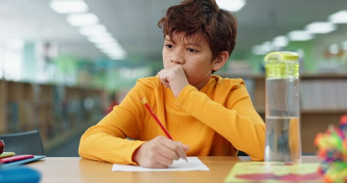 Boy, studying and thinking for math at library in school with notebook for writing notes. Kid, education and homework with stationery for project with numbers for child growth and brain development