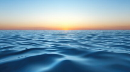 Smooth surface of a calm ocean, with soft ripples reflecting the evening sky -