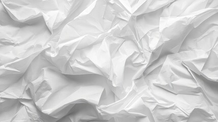Obraz premium Wrinkled white tissue paper texture, with soft creases and delicate folds