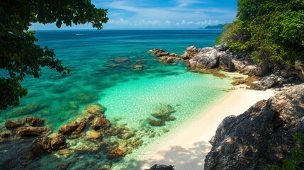A hidden cove on Koh Tao with rocky cliffs and white sand, surrounded by emerald-green waters perfect for snorkeling and relaxing.