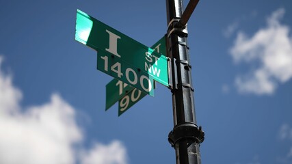 I street NW and 14th street NW street signs in downtown Washington DC symbolizing lobbying and corruption in nations capital