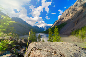 stone podium in mountain landscape with lake