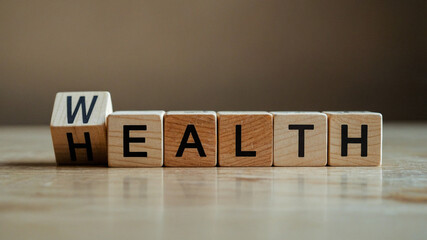 Health and Wealth Concept with Wooden Blocks