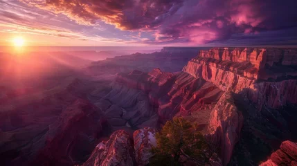 Gardinen Mountain cliff edge overlooking epic canyon landscape at sunrise with beautiful colorful sky and clouds © PUTRI