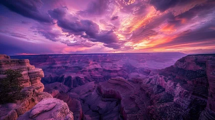 Fototapete Rund Mountain cliff edge overlooking epic canyon landscape at sunrise with beautiful colorful sky and clouds © PUTRI
