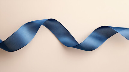 A blue ribbon is shown in a white background. The ribbon is long and curvy, and it is made of a shiny material. The ribbon is the main focus of the image, and it seems to be a decorative element