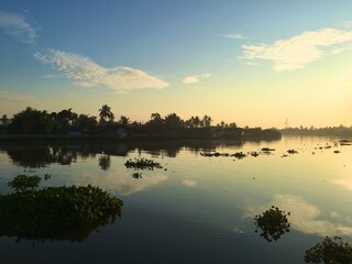 Tropical Sunrise View on Martapura River, Banjarmasin, Kalimantan Borneo, Indonesia.