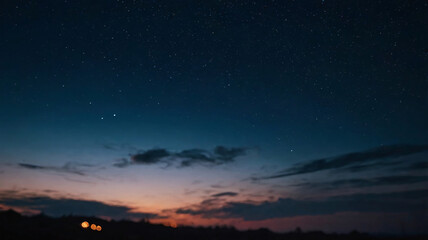Closeup view of clear night sky full of twinkling stars with blur rural background. Beautiful nature galaxy sky background.