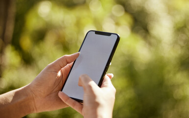 Hands, outdoor and woman with smartphone, typing and texting with internet, nature and social media. Closeup, person and girl with cellphone, mockup space and contact with connection and digital app