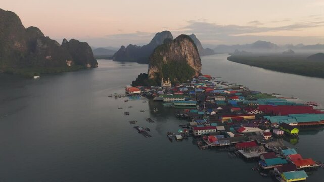 Aerial drone point of view over Ko Panyi floating village in souther of Thailand. Ko Panyi is a fishing village in Phang Nga Province, Thailand. Asian nature travel destination and exotic culture tour