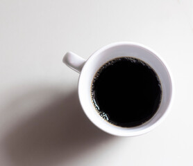 a cup of black coffee, top viewed. 