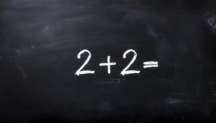 Mathematics Equation 2+2 Written in White Chalk on Blackboard for Education and Learning Concept background 