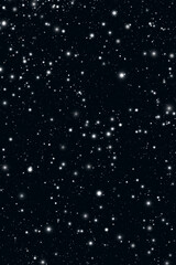 Obraz premium snow falling on black background, stars in space