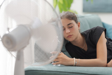 Young woman napping and suffering from the heat