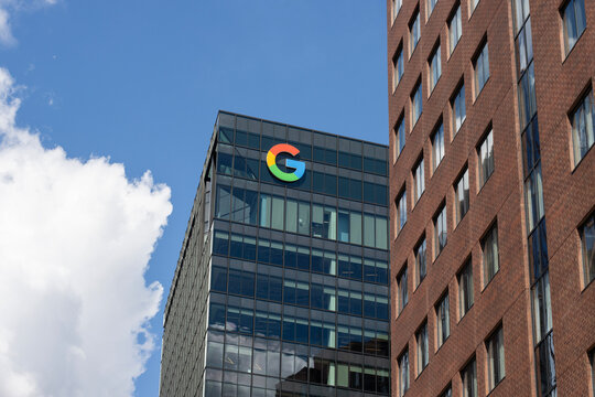Cambridge, MA, USA - June 28, 2022: G logo is seen on Google's office building at 325 Main Street in Cambridge, Massachusetts.