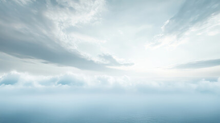 photo of a calm lake with a pale blue color under the cloudy sky