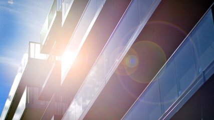 Obraz premium Modern architecture of urban residential apartment buildings on a sunny day. Facade of a modern apartment building.