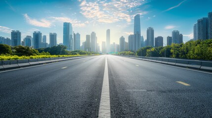A clear view down a smooth highway leading towards a modern city skyline under bright blue skies, capturing the essence of urban progress and connectivity.