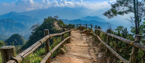 Hiking Path With Wooden Railing On A Mountain Top Ridge