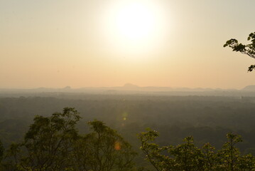 Golden Horizon: Sunrise Over Sigiriya's Lush Forests, Sri Lanka