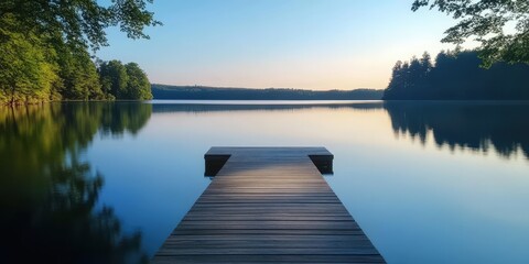 Serene Lake View with Wooden Dock and Surrounding Trees