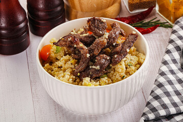 Traditional couscous with beef and vegetables