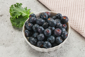 Sweet ripe blueberry on the bowl
