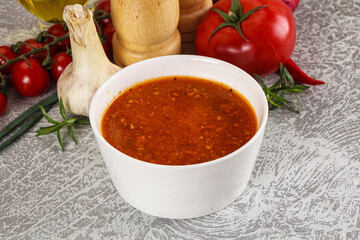 Hot tomato soup with diced chicken