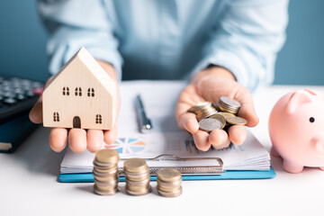Woman decided to save money for house by managing her finances wisely and viewing her home as crucial investment in her future business endeavors. woman, save, money, house, finance, home, saving.
