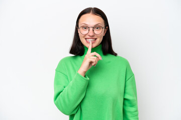 Young caucasian woman isolated on white background showing a sign of silence gesture putting finger...