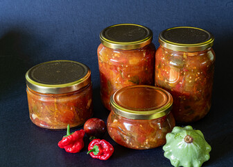 still life, autumn harvest in glass jars, autumn vegetables