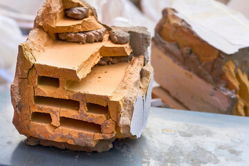 Red orange brick left after the destruction.After the disaster