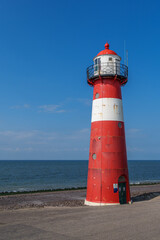 The lighthouse Noorderhoofd at the Dutch coast near Westkapelle